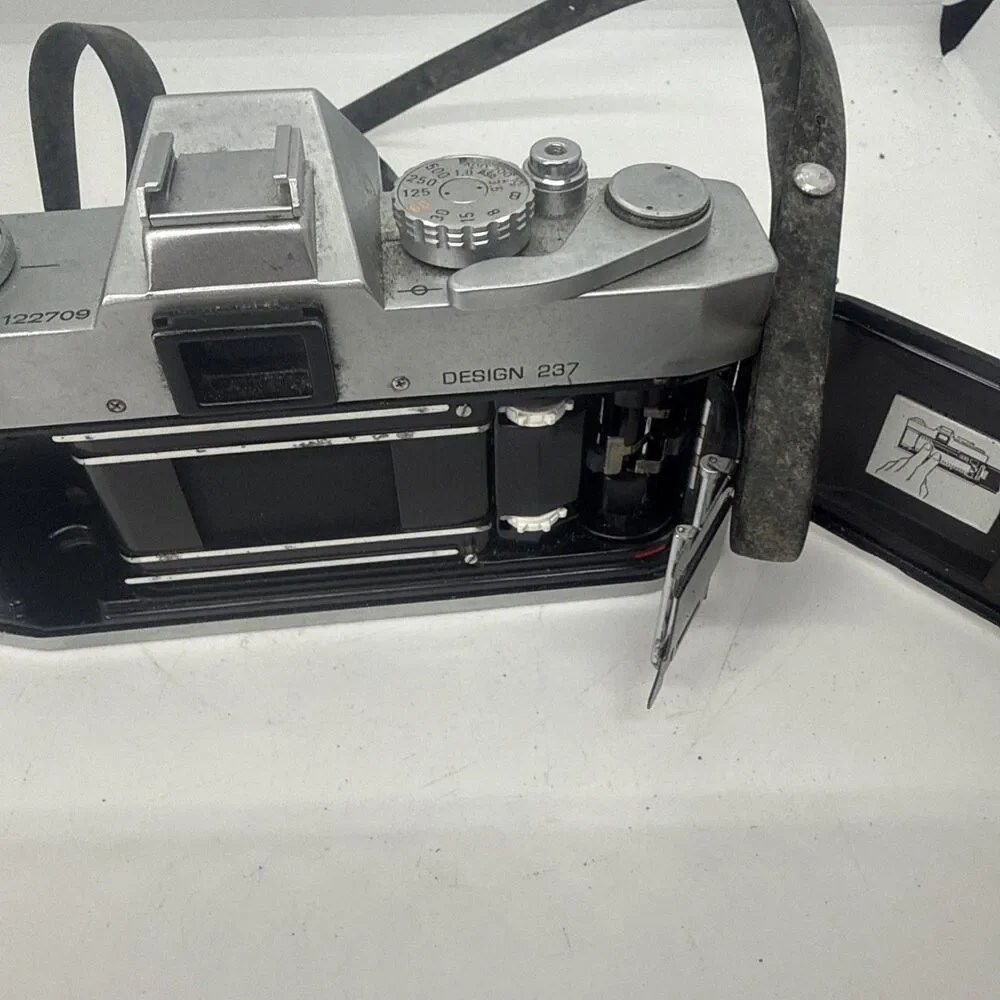 Bell & Howell 35mm Auto 35 Reflex SLR design 237 With vintage case- Working